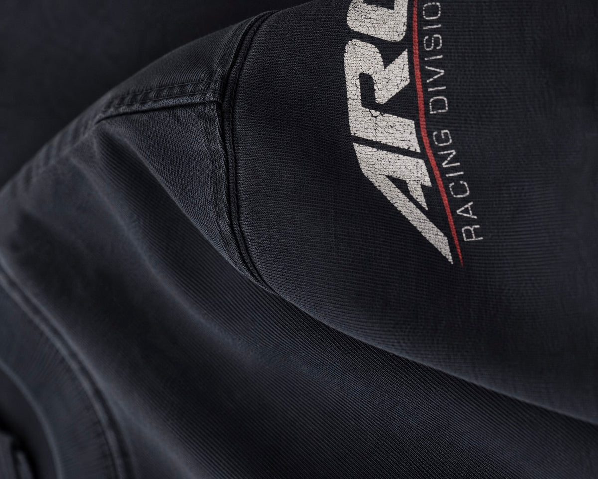 AR-07 Tee in Classic Black — lifestyle